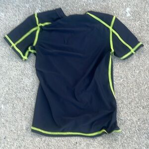 Swimming shirt and a regular shirt